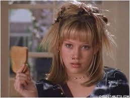 90's and 2000's hairstyles featuring clips and messy buns