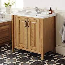 What is the price range for solid wood bathroom vanities? Grenville Traditional Oak Vanity Unit With Basin American Oak Vanity Units Wooden Vanity Unit Traditional Vanity Units