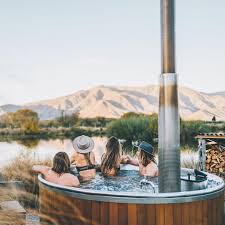 Putting your hot tub inside a greenhouse might seem like a good idea if you are short of space or you want an enclosure over your hot tub. 27 Outdoor Hot Springs Tubs Pools To Warm Up Your Winter Travels