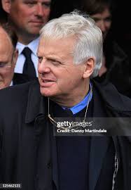 Norman Wisdom's daughter Jackie Wisdom is comforted by a friend at... News  Photo