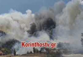 Οι άνεμοι δυσκόλεψαν την προσπάθεια των πυροσβεστών να περιορίσουν τα μέτωπα. Korin8os Ektos Elegxoy H Fwtia Stis Kexries Fwto Video Grtimes Gr