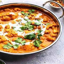 Creamy Cauliflower And Chickpea Curry In 2021 Cauliflower And Chickpea Curry Chickpea Curry Creamy Cauliflower