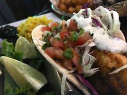 Add the shredded meat, and season with cumin, oregano, salt, and pepper. Chicago S Signature Dishes The Tater Tot Poutine And Ancho Chile Grilled Fish Tacos At Timothy O Toole S Domain Realty