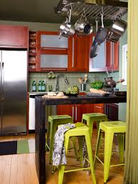 After all, your table isn't just for meals. Small Kitchen With Wall Mounted Bar Table Hgtv