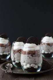 The classic cheesecake batter is combined with crushed oreos to cover the crunchy crust, having everything topped with more oreo cookie crumbs that work for a the author calls these oreo cheesecake bars the easiest, foolproof ones that are also exceptionally great in terms of the flavour. Over The Top Chocolate Cheesecake Oreo Parfaits The First Year Parfait Recipes Desserts Oreo Parfait