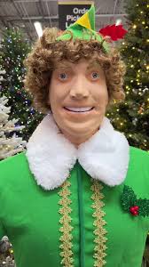 Buddy The Elf Walking Through Candy Cane Lane Forest