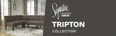 Saber chair legs in a dark finish anchor the versatile style. Signature Design By Ashley Tripton Dining Room Bench Graphite