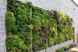 How To Make A Fake Plant Wall Breakpr Artificial Plants Decor Vertical Garden Vertical Garden Diy