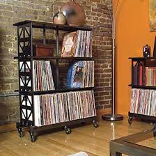 Why hide those iconic album covers in a milk crate when you can give them the spotlight they deserve, in a sleek wood frame on the wall? 27 Vinyl Record Storage And Shelving Solutions