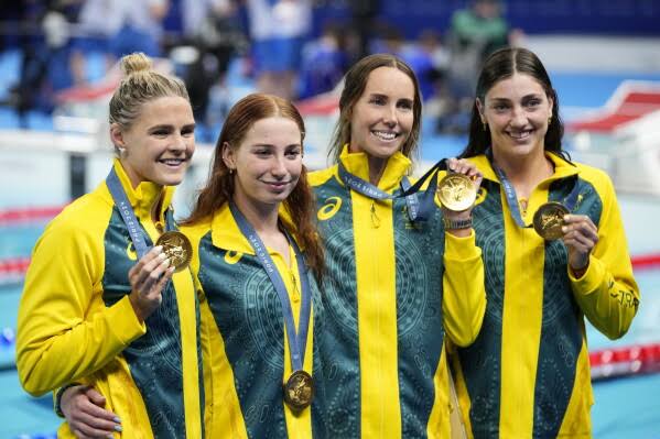 Australian women off to a dominant start in their Olympic swimming rivalry  with the US | AP News