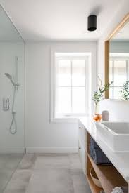 The master bath holds a 1960s chandelier, a 1950s american table, and a saarinen armchair. Best 60 Modern Bathroom Ceiling Lighting Design Photos And Ideas Dwell