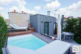 Une Piscine Sur Un Toit Terrasse A Paris Piscinelle On Accede Au Toit Terrasse Par Un Escalier En Colimacon Rhabille D Terrasse Paris Piscine Terrasse Toit