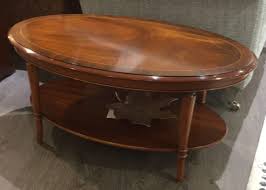 A pair of mahogany side tables. Bradley Classic Oval Two Tier Coffee Table Vale Furnishers