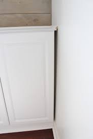 They were so sad that mommy couldn't get it back out. Remodelaholic Playroom Makeover With Built In Cabinets For Storage