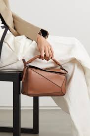 The first completely new bag designed by jonathan anderson has become a loewe icon. Tan Puzzle Small Leather Shoulder Bag Loewe Net A Porter
