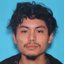 A.G. Drummond asking for public's help finding two fugitives