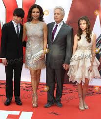 A series of other snaps showed dylan posing with his date, who was wearing a cream corsage to match the one on his suit. Photos And Pictures London Uk Dylan Michael Douglas Catherine Zeta Jones Michael Douglas And Carys Zeta Douglas At European Premiere Of Marvel S Ant Man At The Odeon Leicester Square London On July 8th