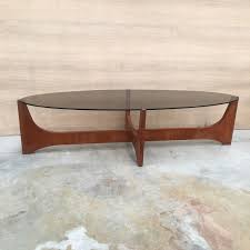 Coffee table with oval glass top in chrome finish. Oval Coffee Table With A Teak Base And A Smoked Glass Top By Hugues Poignant 1960s Design Market