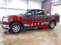 Image result for Dark Toreador Red 2006 Lincoln