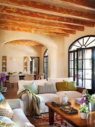 Living Room White Slip Covered Sofas Wood Beam Ceilings Coastal Living Rooms Coastal Decorating Living Room Spanish Style Homes