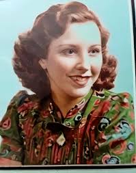 Can someone restore the colors in this old photo of a great great  grandmother?