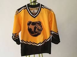 The boston bruins' pooh bear logo — a universally debated topic. Boston Bruins Koho Youth S M Jersey Alternate Third Jersey Pooh Bear Boston Bruins Bruins Jersey