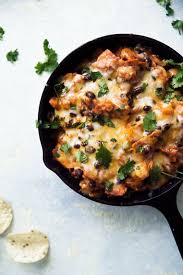 Butternut Squash And Black Bean Enchilada Skillet Ambitious Kitchen Recipe Butternut Squash Recipes Butternut Squash Black Bean Vegetarian Mexican