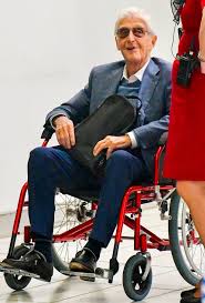 You might ask this question of someone who is only there on a temporary basis. Grinning Michael Parkinson Seen In Rare Snaps Being Whisked Out Of Airport In Wheelchair Mirror Online