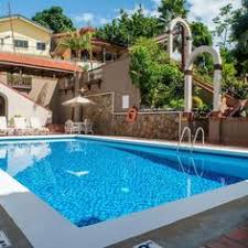 Kapok Hotel Located 5 Minutes Walk From Queens Park Savannah And From Ellerslie Plaza Kapok Hotel Features A Swimming Pool Garden And A Sun Terrace Free W Hotel