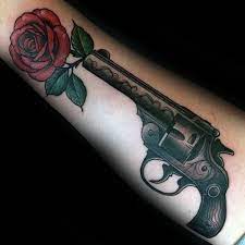 Tattoo art with revolvers, roses and vintage ribbon, shirt graphic. 40 Guns And Roses Tattoo Designs For Men Hard Rock Band Ink Ideas