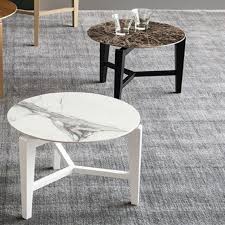 Just press a button, placed on the long side, to adjust the height to 7 different positions. Calligaris Symbol Ceramic Top Round Coffee Table Coffee Tables Beadle Crome Interiors