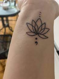 Lotus Flower With Semi Colon Small Lotus Flower Tattoo Wrist Tattoos For Guys Lotus Flower Tattoo Wrist