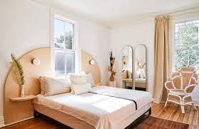 Install wall lights on each side of your bed to. The Headboard Sconce Might Be Our Favorite Hotel Inspired Small Bedroom Hack Emily Henderson