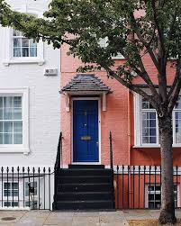 Bright purple makes this choice of front door colors stand out in a crowd. Peach House Blue Door Google Search