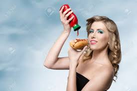 Or more specifically home made tomato ketchup. Hungry Girl With Fashion Look Posing With Curly Blonde Hair Putting Stock Photo Picture And Royalty Free Image Image 28975568