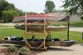 5.6 diy universal roof rack ideas. Diy Rolling Kayak Storage Rack 2x4s And Caster Wheels Paddle Fishing Com