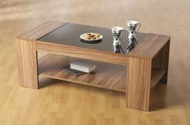 This rectangular coffee table in high gloss black has a modern, elegant look and feel, and will complement the furniture in your home. Valentine Walnut Veneer Black Gloss Coffee Table