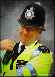 While visiting London England a few years ago I shot this image. I really  think that he fits the perfect image of a London Bobby...What do you all  think?.... Pietro