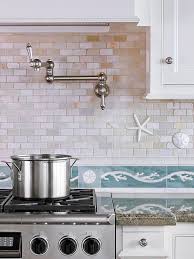 Flooring experts waiting to help, give us a call! 21 Tile Backsplash Ideas For Behind The Range That Add A Bold Kitchen Accent Beach Kitchens Coastal Kitchen Beach House Kitchens