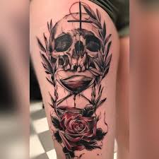 Hourglass is a historical instrument for measurement of time and despite the fact that it has been replaced by watches a long time ago, it is still revered for its aesthetic. Cherub And Baby Angel Tattoo Designs And Meanings Angel Hourglass Tattoo