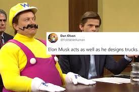 Elon musk opens 'snl' by telling his mother that he's gifting her dogecoin for mother's day. Nh78fnke J1fym