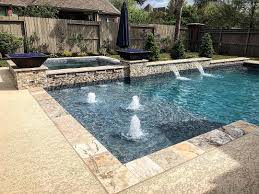 Custom Geometric Pool And Spa With Rolled Edge Spa And Fire Bowls Pools Designs Poolideas Swimmingpooldesign Geometric Pool Pool Houses Rectangle Pool