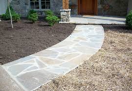 Flagstone pieces that range from roughly 36 x 36 to 12 x 12 stacked flat on a pallet. Walkways Stairways Patios Tennessee Building Stone