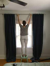 Excess moisture has tremendous potential for damaging bathrooms. How To Install A Bathroom Exhaust Fan The White Apartment Hanging Curtains Hanging Curtain Rods Plaster Walls