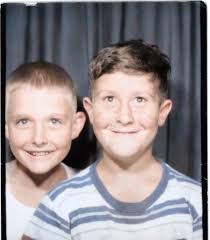 Who are the leaders in the J. Finkelstein and Sons photo from the 1960s or  1970s in Woonsocket?