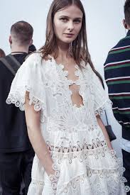 Fabrics That Tell Stories A Folkloric Lace Dress With Decorative Bird Motif Behind The Scenes Of Wedding Dresses Corset Vintage Dresses Perfect Wedding Dress