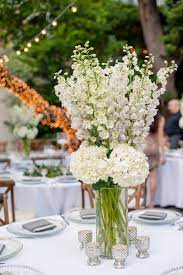 All White Centerpiece Of Delphinium And Hydrangea White Hydrangea Centerpieces Hydrangea Centerpiece Wedding Flower Centerpieces Wedding