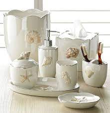Seashells are fun to collect, and they look so pretty on display. Decorate Your Bathroom With These Beach Themed Accessories Coastal Bathroom Decor Ikea Bathroom Accessories Bathroom Decor Sets