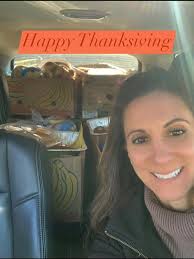 My beautiful daughter delivering food to families for Thanksgiving