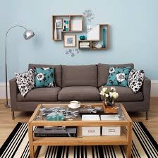 Lighter monochromatic tones of brown and turquoise create a sense of harmony. Inspiration For Living Room Teal Living Rooms Brown Living Room Blue Living Room